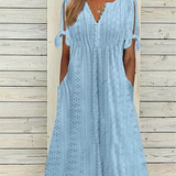Vestido Elegante con Escote en V y Detalle Hueco